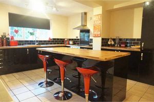 The modern-looking kitchen at the football legend's former home