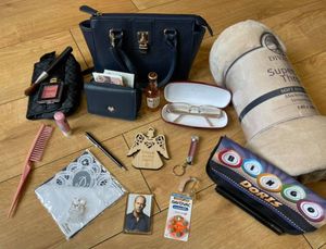 Doris's handbag packed with her favourite items. Photo: Lil & Doris Facebook page