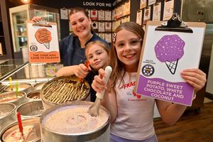Coleham pupils Harmony Chappell and Florence Jennings with Gaia Berni from Gelatistry.