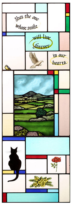 The windows reflect aspects of Michelle's life – including a view of The Wrekin, and Penny the family cat.