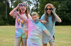Much Wenlock Primary School colour run. Pictured (left to right) is Millie Miles, Callum Crocombe and Robyn Creswell