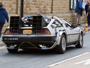 A modified DeLorean car on a road