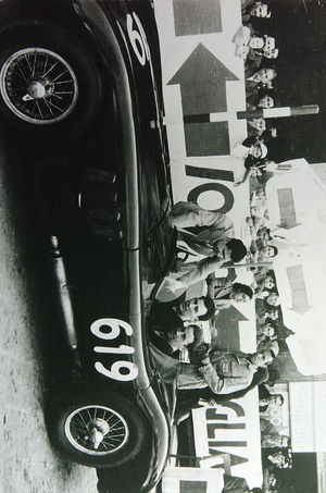 Norman Dewis in a Jaguar