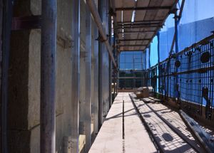 Work underway on a new steel frame for the exterior of the building on Friday, May 16.