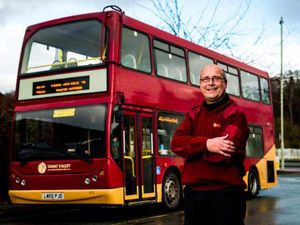 Supporting image for story: 'John the Bus' marks 30 years at the wheel in Oswestry