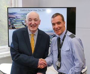 Alan being congratulated for his 50 years’ service by RAF Cosford Station Commander Tone Baker