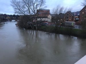 The River Severn is very high and the towpaths are flooded in Shrewsbury
