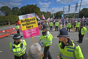Police monitor the protest and counter-protest