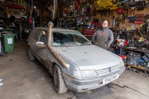 Image shows West Midlands dad Charlie Burns with his modified Peugeot 'submarine'.