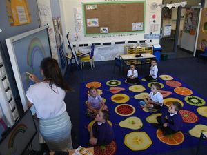 Supporting image for story: In Pictures: The ‘new normal’ as markets and schools reopen and racing restarts