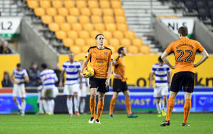 Dave Edwards of Wolverhampton Wanderers stands dejected after Queens Park Rangers score to make it 1-2. (AMA Sports)