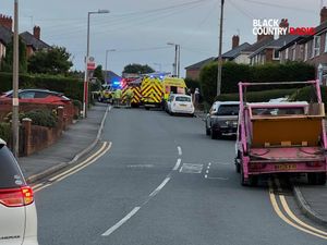 Supporting image for story: Elderly driver cut free from his car after crashing into parked vehicle and overturning in Halesowen