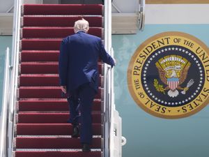 President Donald Trump boards Air Force One at Joint Base Andrews, Maryland, on his way to Riyadh, Saudi Arabia