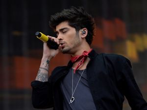 Supporting image for story: Zayn Malik tells screaming fans ‘I’ve missed this’ during debut UK solo show