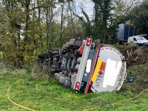 Supporting image for story: In pictures: Fuel tanker in a Shropshire village that rolled down an embankment while full of 36,000 litres of kerosene