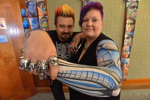 Dutch Bihary from Seattle shows off his work on model Debra