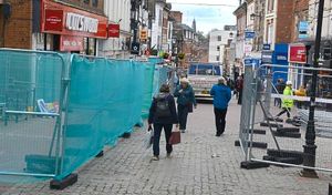Barriers surrounding the work areas on Pride Hill