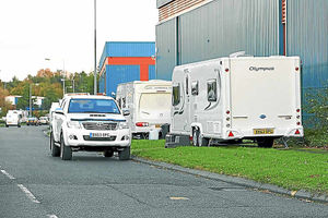 Caravans park on the side of the road close to where firms operate on Stafford Park 12. Businesses said they presented a danger.