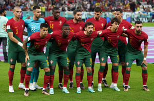 Portugal players, back row, left to right, Pepe, Diogo Costa, William Carvalho, Ruben Neves, Ruben Dias, Cristiano Ronaldo, front row, left to right, Joao Cancelo, Nuno Mendes, Bernardo Silva, Joao Felix and Bruno Fernandes line up before the FIFA World Cup Group H match at the Lusail Stadium in Lusail, Qatar. Picture date: Monday November 28, 2022.