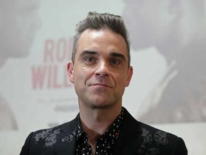 Supporting image for story: Robbie Williams on fame, family and not going out - interview