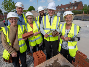 Supporting image for story: 'Laying the first bricks is always a special moment,' developer says as building of almost 100 new energy-efficient council homes starts in Bushbury