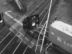 Supporting image for story: Lorry driver smashes through level crossing