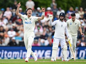 New Zealand’s Matt Henry celebrates after taking the wicket of England’s Zak Crawley