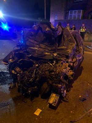The car was left unrecognisable after the crash. Photo: @SuttonCfld_Fire