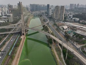 Supporting image for story: Sao Paulo river turns emerald green as drought continues