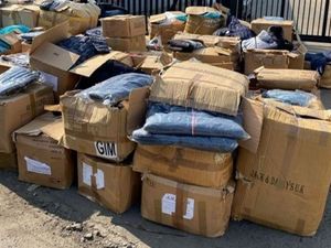 Supporting image for story: £1.5 million of fake clothes and shoes seized in Walsall raid