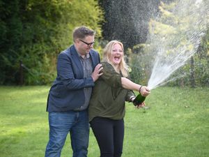 Supporting image for story: Laid-back lottery winners from Walsall claim their prize – a month late