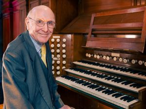 Bill Hutcheson sitting at an organ