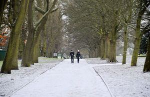 People enjoy their daily walk among the frost and snow at East Park in Wolverhampton