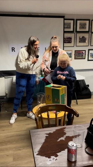  Katie Gregory, Molly Worthington and Ella-Mai Griffin drawing the raffle 