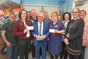  Pictured is  Cyril Barret with senior matron Kirsty Lewis and the blood pressure monitors.