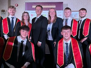 Councillor Martin Murray with Jenny Johnston and apprentices from KMF Group Limited.