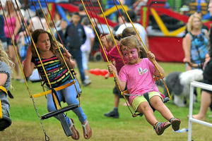 Children enjoying a ride at Bloxwich Carnival