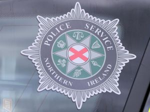 A stock picture of a Police Service of Northern Ireland logo