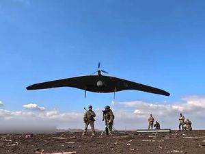 Russian soldiers launch a drone in Ukraine
