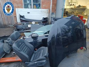 Supporting image for story: Chop shop raid uncovers 14 broken up cars and bikes in shipping containers