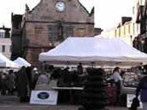Supporting image for story: Farmers show wares at market