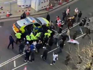 Supporting image for story: PM resists calls to apologise for Savile slur after Starmer rescued from mob