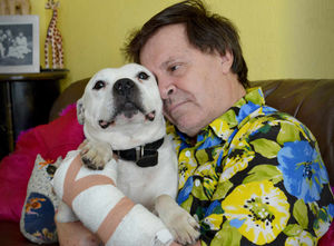 Paul Jones from Reedswood recovers with one of his dogs Buster