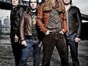 Supporting image for story: James drums through the pain barrier