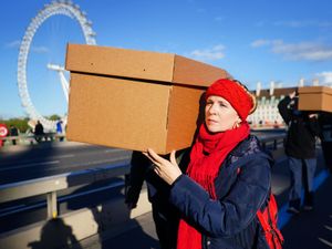 Supporting image for story: Smart motorways protesters carry coffins through London