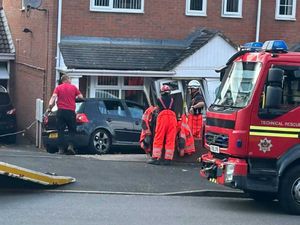 Supporting image for story: Car crashes into house on residential street leaving residents shocked and angered