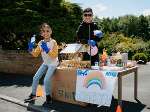 Supporting image for story: Telford siblings do their bit for NHS with fruit and drink stall