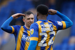 Chey Dunkley of Shrewsbury Town celebrates with Jordan Shipley (AMA)