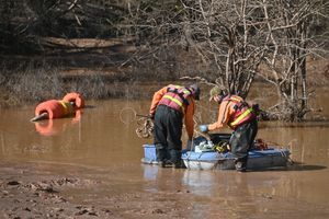 Specialist teams move in as the water level finally drops