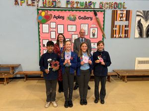 Teacher Gemma Craig at Apley Wood Primary Academy and APCC Steve Mackay alongside pupils from the academy